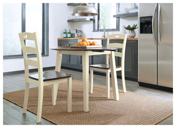 Turn your eat-in kitchen or dining space into a cottage-chic retreat with this round drop leaf table. Two-tone finish serves up a double helping of charm. When accompanied by the matching ladderback chairs, what a storybook scene.<br><br><b>Additional Dim