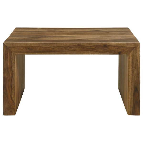  the table boasts an auburn finish that enhances its unique grain patterns. The U-shaped modern silhouette with m