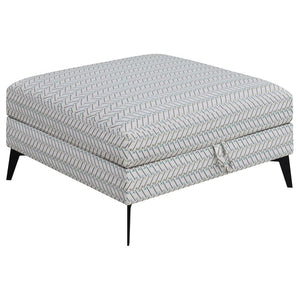Function and fashion mix with a delightful result in this modern storage ottoman. Brighten a sofa set or sectional with a square ottoman adding plenty of surface and storage space. Covered in fabric with a compelling geometric design, its gray-centered pa