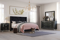 The Huxley 4-Piece Bedroom Set in Black combines contemporary glam with durable construction for a stylish and functional addition to your home. This set includes an upholstered bed with headboard, footboard, two side rails, and slat kit, along with a 6-d