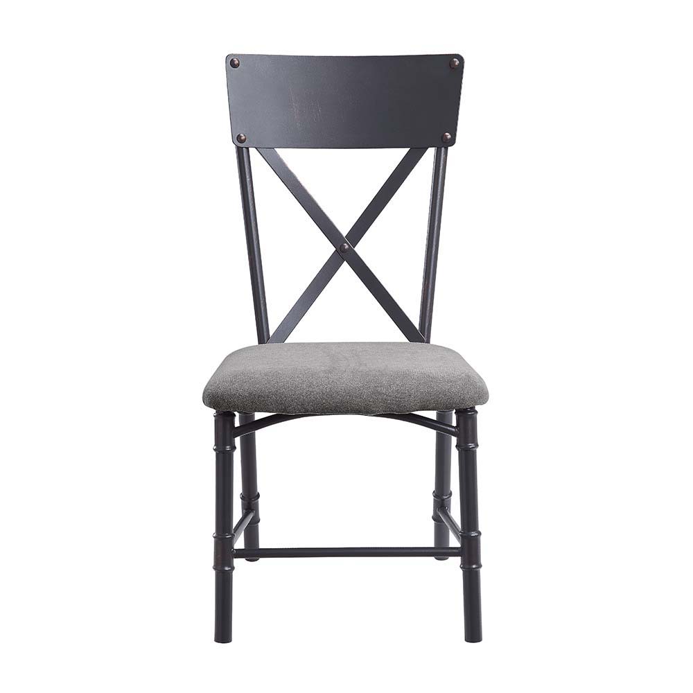 Featuring a rectangular wooden tabletop in an oak finish the Edina dining table merges farmhouse and industrial elements for the ideal dining table for the modern home. Metal corner protectors with rivets that elevate the tabletop. The metal pipe trestle 