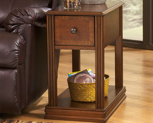  fluted details and an oil-rubbed effect on the rich finish give this chairside end table such great character. The base shelf is just the place for a storage basket