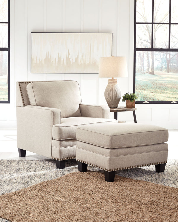 For a fresh spot in your space, turn to this designer chair and ottoman. Wind down at the end of a long day when you sink into this canyon of comfort. <h4><b>Claredon - Linen - Chair</b></h4> <table width=-"100%-"><colgroup><col style=-"width: 30%