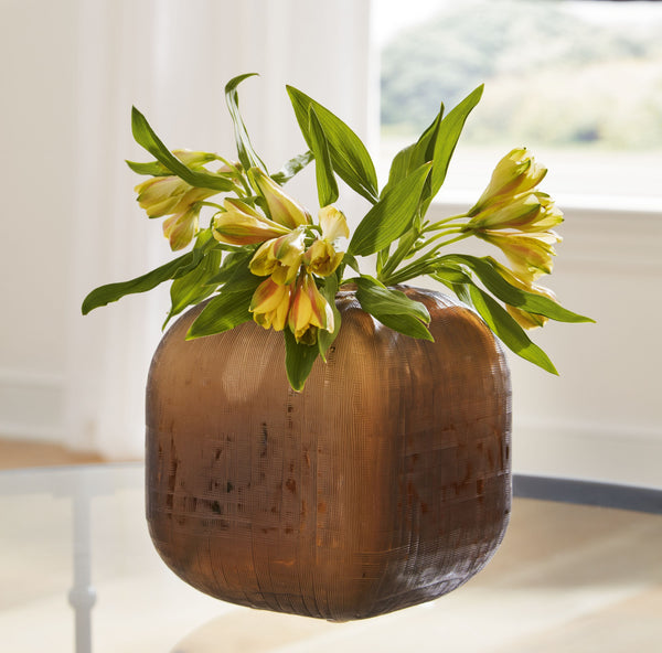  this vase boasts an eye-catching fine grid texture that-'s sure to make a statement. Fill it with florals