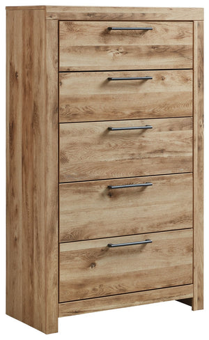 Inspired by natural beauty, refined to perfection. This chest of drawers brings cozy outdoor vibes to your bedroom with its warm and inviting golden rustic finish. Handles in an antiqued gunmetal hue adorn the five drawers on its framed front, adding an i