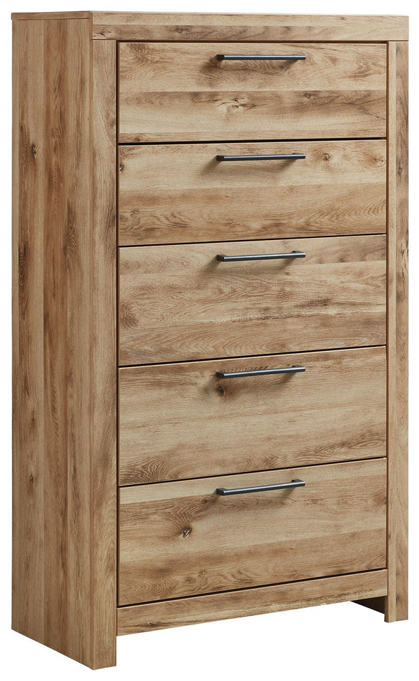 Inspired by natural beauty, refined to perfection. This chest of drawers brings cozy outdoor vibes to your bedroom with its warm and inviting golden rustic finish. Handles in an antiqued gunmetal hue adorn the five drawers on its framed front, adding an i