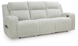 Trend-right style, meet irresistible modern function. Your living room gets a cozy-cool upgrade with this power reclining sofa. Curl up in its ultra-chic corded upholstery and recline with one-touch controls. Is it movie night or game time? With ambient L