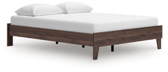 At the intersection of classic cool and chic sophistication youâ€™ll find this queen platform bed. The rich brown finish over replicated walnut wood grain offers an authentic touch that plays well any way you style it. Minimal yet elegant in its design, t