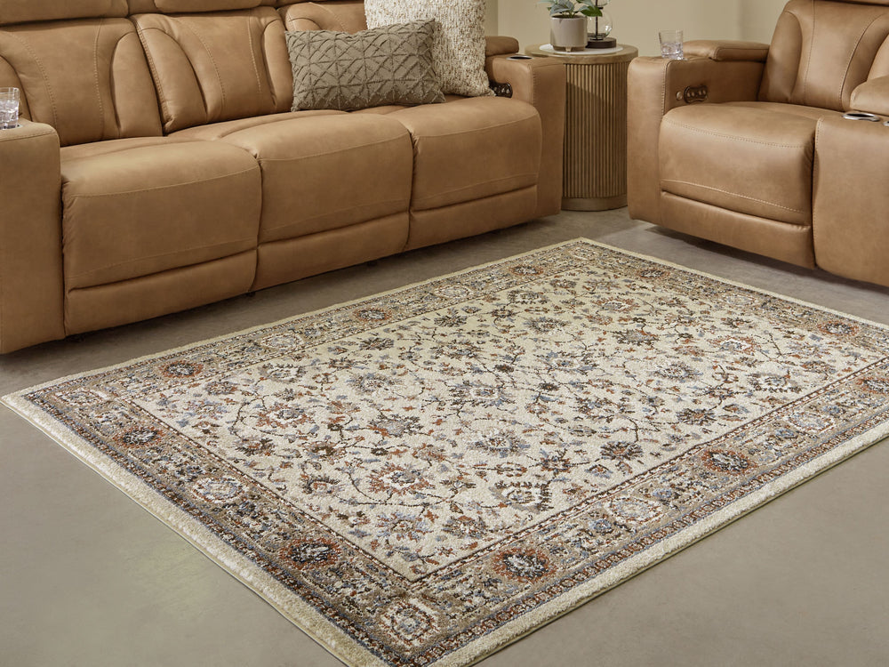 The muted tones and floral pattern of this rug lends classic character to your living space. Its traditional feel is made more modern with shades of blue, brown, rust and cream. Timelessly designed, it helps you to craft your ideal aesthetic from the grou