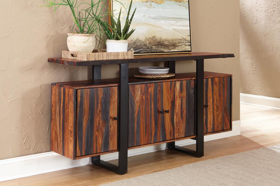 Cozy and rustic, this grey sheesham server is full of charm. Perfect for a contemporary space, the elongated lines on the front feature a sleek black finish. Variations in hue and in wood grain offer a stunning visual that looks great on its own or when t