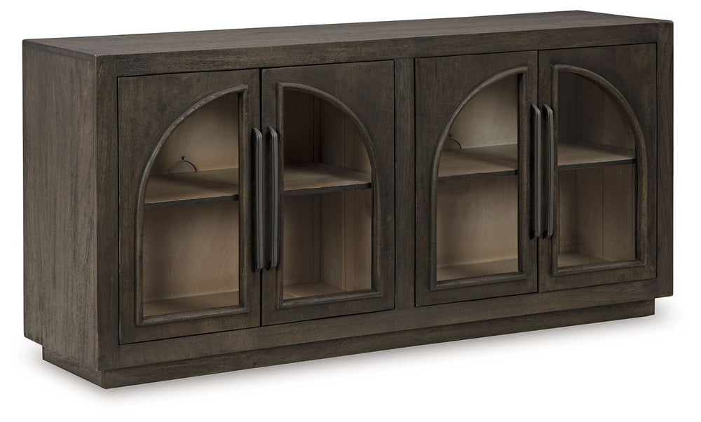 Bring a timeless look to your home or office with this accent cabinet. Traditional lines and a distinctive two-tone finish lend seriously classic vibes to this piece. Arched glass door fronts and two shelves make it easy to display and store in stunning s