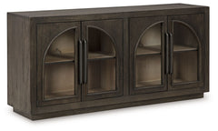 Bring a timeless look to your home or office with this accent cabinet. Traditional lines and a distinctive two-tone finish lend seriously classic vibes to this piece. Arched glass door fronts and two shelves make it easy to display and store in stunning s