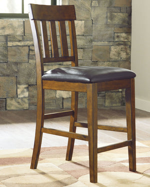  burnished finish. Faux leather upholstery easily wipes clean.<br><br>