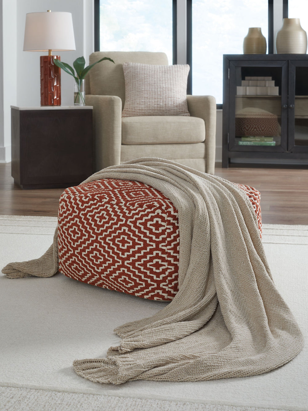 Comfort meets casually chic style in this throw blanket. Its neutral hue and knitted construction create trendy textural variation when draped over a sofa or the foot of a bed. And it goes beyond style, with the soft chenille fabric acting as a cozy compa