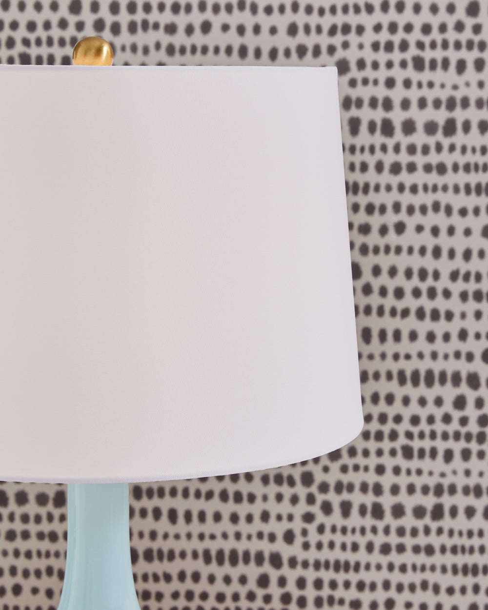 More than mere lighting, this spectacular table lamp illuminates your good taste. Its elegant silhouette, crafted from aqua blue glass, is contemporary artistry at its finest. No two lamps will be quite alike.<br><br><b>Additional Dimensions</b><br><ul><l