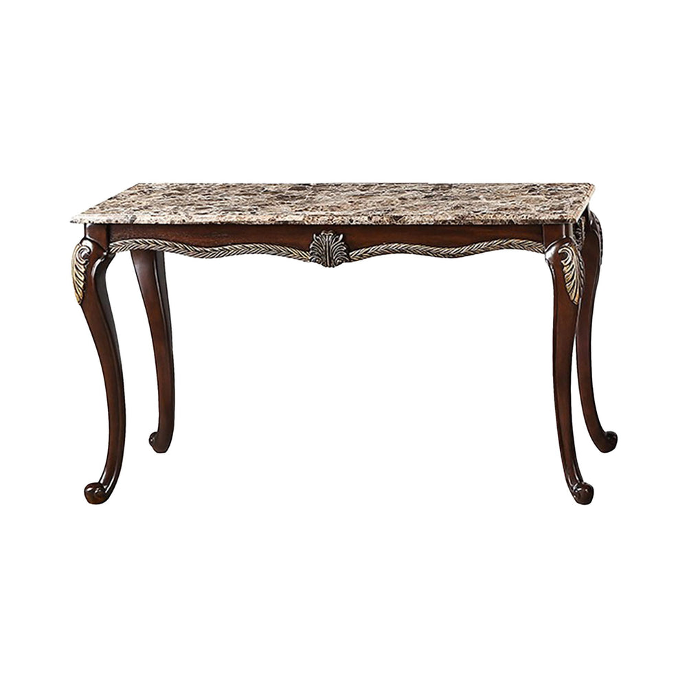 The Royal Classics Maximus Sofa Table in cherry is a perfect blend of heirloom craftsmanship and timeless design. Expertly crafted from solid pine with premium polyurethane carving details, this table offers both durability and long-lasting beauty. The li
