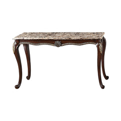 The Royal Classics Maximus Sofa Table in cherry is a perfect blend of heirloom craftsmanship and timeless design. Expertly crafted from solid pine with premium polyurethane carving details, this table offers both durability and long-lasting beauty. The li