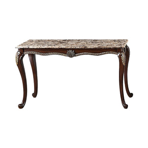 The Royal Classics Maximus Sofa Table in cherry is a perfect blend of heirloom craftsmanship and timeless design. Expertly crafted from solid pine with premium polyurethane carving details, this table offers both durability and long-lasting beauty. The li
