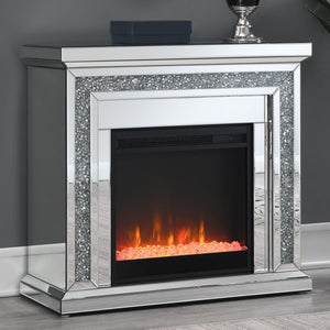  crushed crystals lend a luxurious accent to this glam fireplace. Covered by mirror tiles