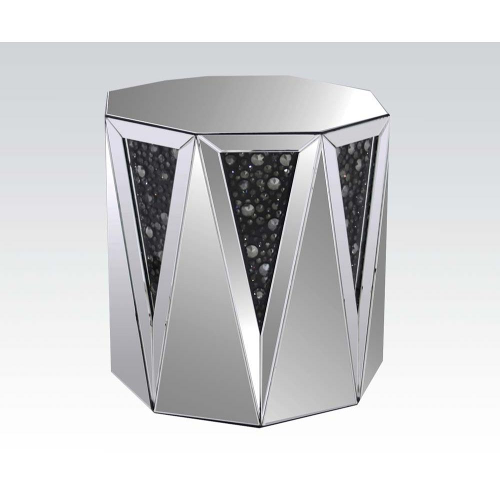 The Noor mirrored occasional table will add a modern glam style to your living room. This drum table features a sleek and unique style with its octagonal top, triangular base, and crystal inserts. Add this coffee table to any room to add to add style and 
