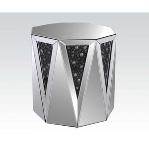 The Noor mirrored occasional table will add a modern glam style to your living room. This drum table features a sleek and unique style with its octagonal top, triangular base, and crystal inserts. Add this coffee table to any room to add to add style and 