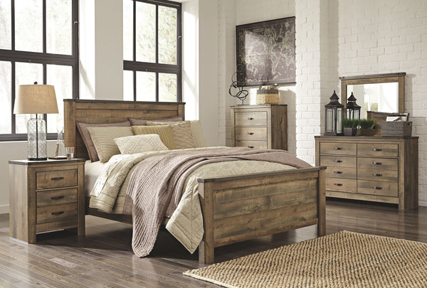  plank-style details and nailhead trim pay homage to reclaimed barn wood