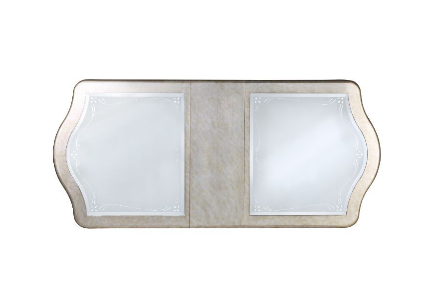 Every piece in the Esteban dining collection reflects vintage glam style! Gorgeous details such as raised scroll trim and crystal handles with mirrored fronts on the case pieces transform the entire collection into something extraordinary. The antique cha