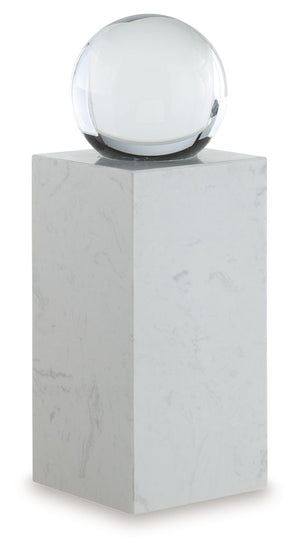 This exquisite sculpture effortlessly combines the purity of clear crystal with the timeless elegance of white marble. Contrasting textures and materials create a captivating visual experience, making it a striking focal point in contemporary settings. It