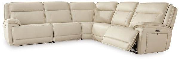 This power reclining sectional is the perfect combination of sleek style and thoughtful functionality. Engineered for comfort and convenience, the set offers concealed storage compartments and endless relaxation. From movie nights to family gatherings, it