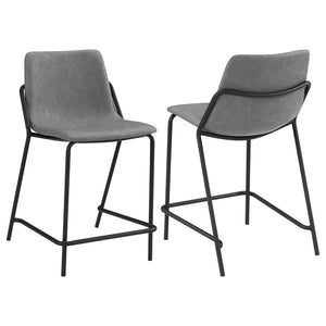 This pair of two stools offer a minimal look and a contemporary vibe. Supported by thin and tall frame in a black finish, it has an open and airy design that works with many styles. Each chair has a bucket style, Mid Century inspired seat, which is wrappe