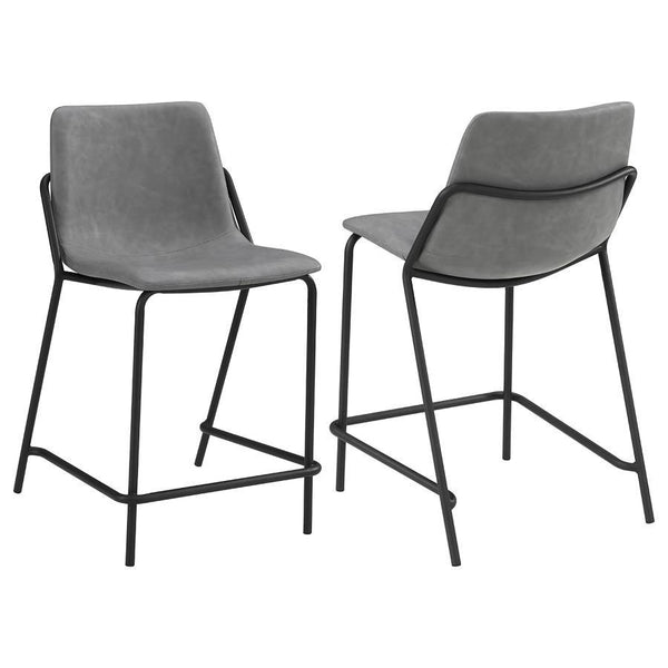 This pair of two stools offer a minimal look and a contemporary vibe. Supported by thin and tall frame in a black finish, it has an open and airy design that works with many styles. Each chair has a bucket style, Mid Century inspired seat, which is wrappe