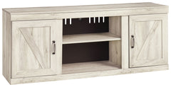 Express your modern farmhouse style with this TV stand with fireplace option. Its wispy white finish over replicated oak grain is a delightful change from the ordinary. Clean-lined, classic styling with barn door inspiration provides a country-chic aesthe