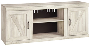 Express your modern farmhouse style with this TV stand with fireplace option. Its wispy white finish over replicated oak grain is a delightful change from the ordinary. Clean-lined, classic styling with barn door inspiration provides a country-chic aesthe