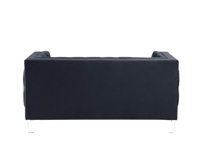 Sophistication meets modern with the Ansario living room collection. The rich blue velvet adds character to any room. Showcasing a square back, high arms, and nail-head trim, feature button tufted accents. The acrylic legs give off a modern vibe to the pi