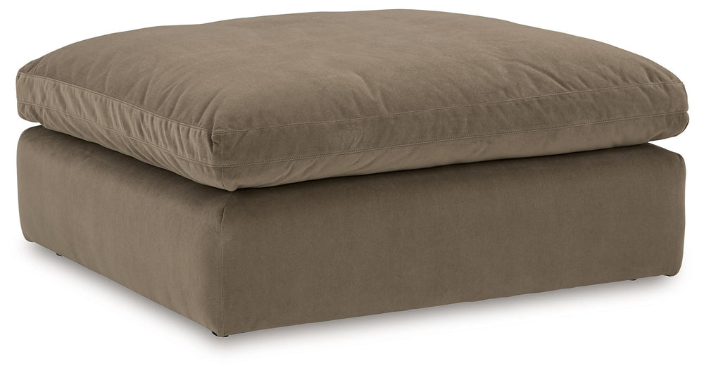 Find yourself inspired by elevated yet functional style. This oversized accent ottoman balances an ultra-plush top with a clean-cut appearance. Its versatile design caters to your contemporary lifestyle, pairing expertly with a sofa or sectional.<br><br><