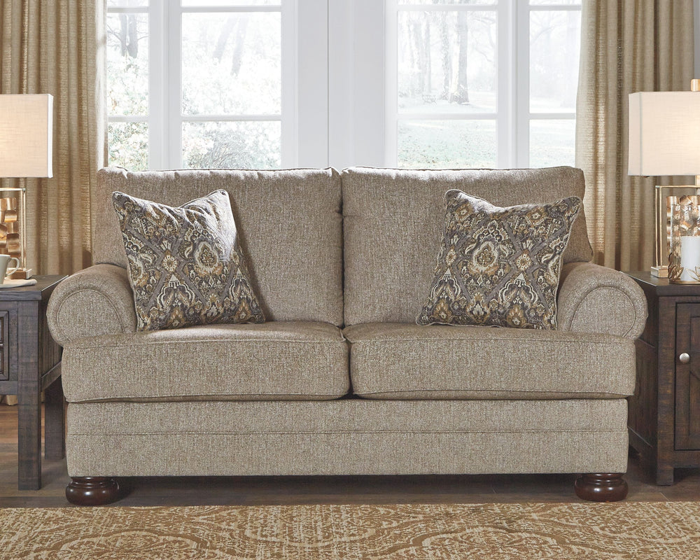 This sumptuously styled loveseat proves that a richly traditional look doesnâ€™t have to break the bank. Flared effect gives the classic roll arms a relaxed feel, while the choice of a plush chenille upholstery in oatmeal is earthy elegance at its best. D