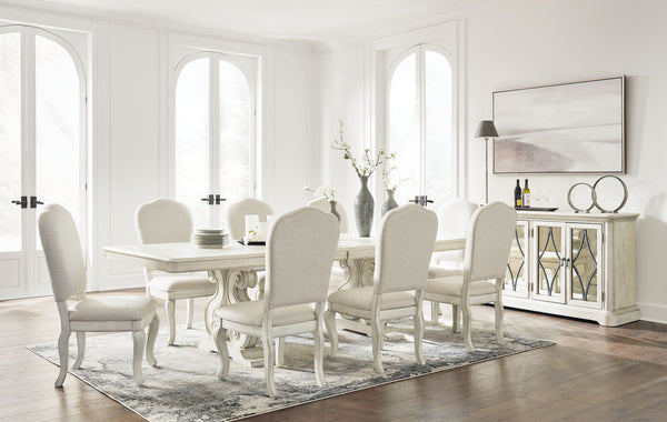 Add a touch of romance to your home with this dining room set. The painted finish and shapely silhouette are all about easy elegance. Turning the focus on the double sculptural pedestal base, this graceful table adds a dash of upscale luxury to the dining