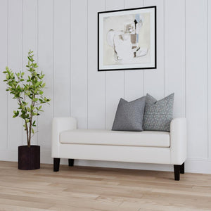  cozy silhouette. The bench seat and frame are upholstered in soft vanilla fabric