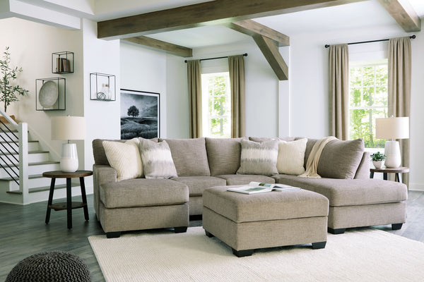 Easy on the eyes, this double chaise sectional group expands your seating options with ease. Its generous scale cradles you in comfort, while luxurious upholstery pampers you from head to toe. A collection of coordinating accent pillows adds to the indulg