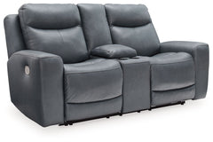If sleek and modern is your style, this power reclining loveseat is ready to deliver a fresh look in comfort seating. With a plethora of power features and perfectly positioned scoop seating for unparalleled relaxation, this recliner will be your go-to sp