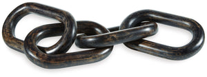This sculpture sets the standard for casually cool art. Interlocking wood rings in a distressed black finish add an urban industrial element to your decor. When displayed on a TV stand or fireplace mantel, or draped across a stack of books, it-'s such an 