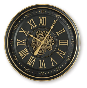 This striking wall clock is a beautiful blend of classic style and industrial charm. A black finish and goldtone Roman numerals add a touch of sophistication, while exposed moving gears create a captivating focal point. Talk about timeless style.<br/><br/