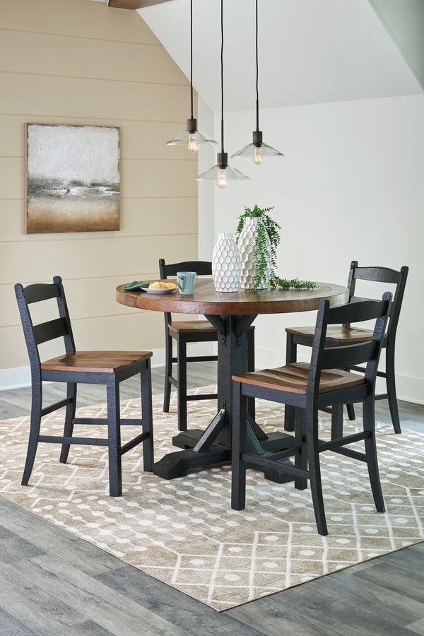 This set serves up the best in cottage styling. A charming choice, its two-tone finish is versatile enough for many casual aesthetics. Round counter height table features a sturdy post and bracket base design in a rustic black finish with a thick 48-" rou