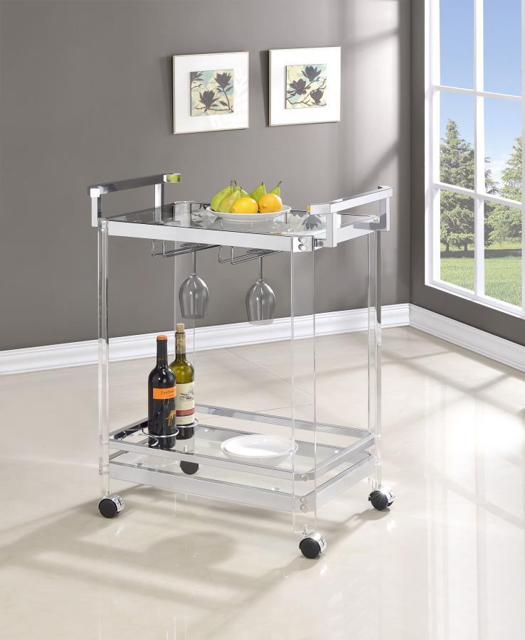 A serving cart is a delightful accoutrement for any home bar or indoor patio. This serving cart takes it to another level with an acrylic and metal frame finished in chrome. It features clear tempered glass shelves that-'s simple yet modern. Bottom shelf 
