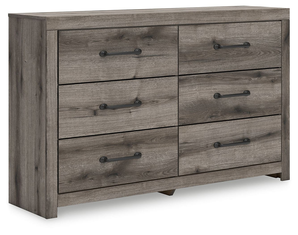 Combining a casual aesthetic with functional flair, this dresser suits styles from rustic to industrial. Its smooth-gliding drawers store everyday essentials with ease, from clothes to bed linens. Elongated drawer pulls in a dark hue polish off the look, 