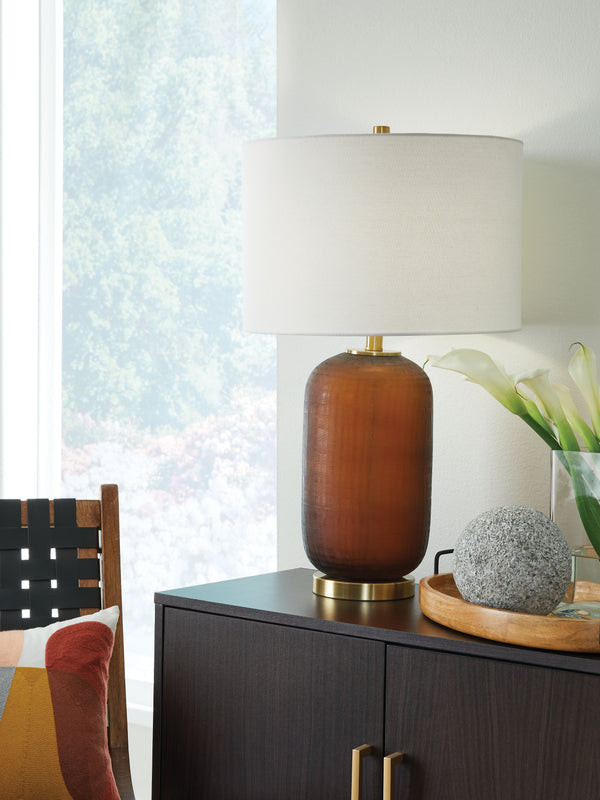  thanks to its rich amber-hued glass base enhanced with goldtone accents. Whether your decor is modern or eclectic