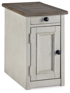 Display and contain your favorite things with this end table. Its textured antique white finish creates a vintage two-tone look, while outlets and USB ports provide functionality. This is a piece you will enjoy for years to come.<br><br><b>Additional Dime