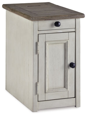 Display and contain your favorite things with this end table. Its textured antique white finish creates a vintage two-tone look, while outlets and USB ports provide functionality. This is a piece you will enjoy for years to come.<br><br><b>Additional Dime