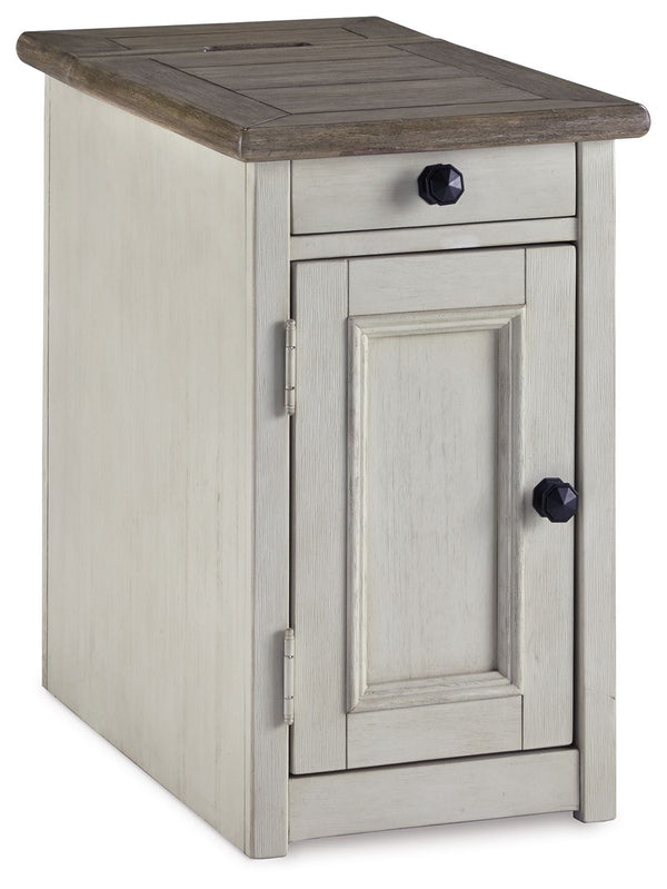 Display and contain your favorite things with this end table. Its textured antique white finish creates a vintage two-tone look, while outlets and USB ports provide functionality. This is a piece you will enjoy for years to come.<br><br><b>Additional Dime