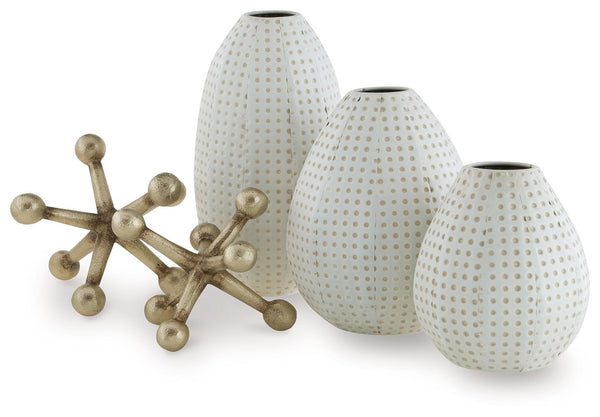 Celebrate fresh, contemporary design with this accessory collection. The sculptures and vases take the classic color combination of white and goldtone and bring it to the present with decidedly modern silhouettes. With pieces in a variety of sizes, this s